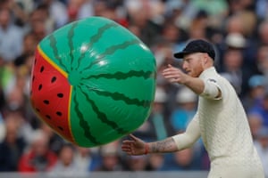 Ben Stokes tries to catch a blow-up watermelon that bounced onto the pitch.