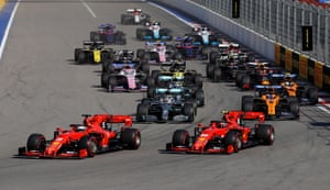 Vettel leads at the first corner.