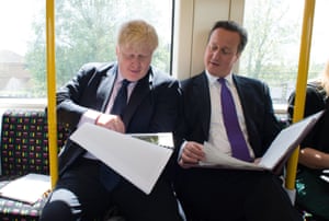 Boris Johnson and David Cameron on an Underground train.