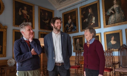 Ewan Frost-Pennington, centre, with his mother, Iona, and his father, Peter, in the drawing room