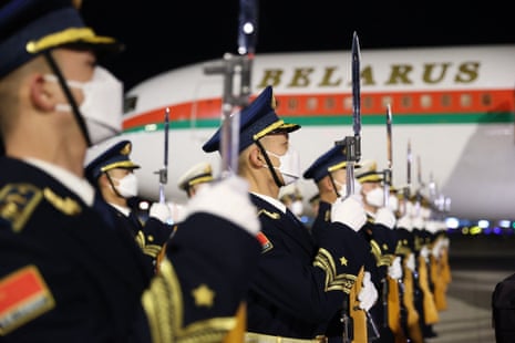 Chinese honour guards stand at attention during a welcome ceremony for Lukashenko at the airport.