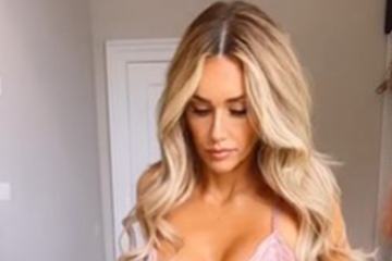 Pregnant Laura Anderson reveals bump as she poses in pink lace bra