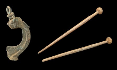 A Roman brooch and pins found at the site