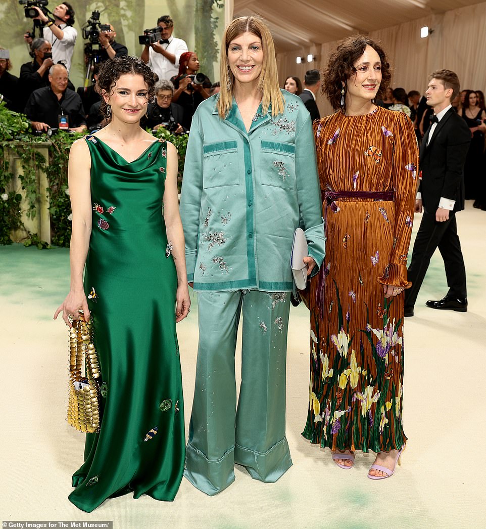 Vogue staffers Chloe Malle, who wore an H&M dress, Virginia Smith and Nicole Phelps put on a colorful show