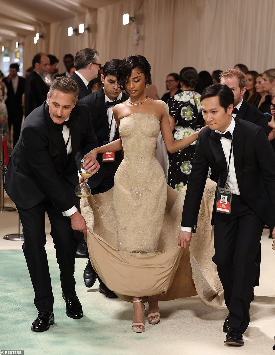 She had assistance walking on the red carpet - due to the delicate nature of her gown
