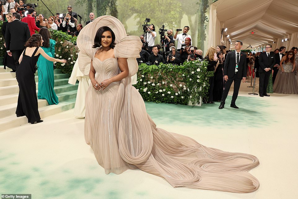 Mindy Kaling looked sensational in a Gaurav Gupta designed gown; the cream colored gown had a removable cape