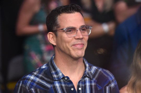 Steve-O smiling, looking away from camera