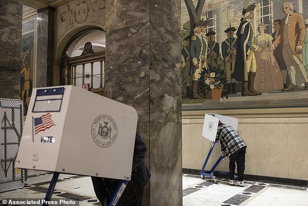 Voters cast their ballots at the Bronx County Supreme Court in New York on Election Day