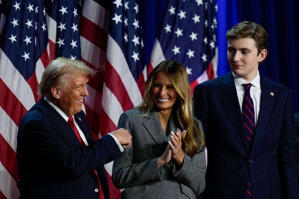 Donald Trump dances on stage with Melania Trump and son Barron Trump