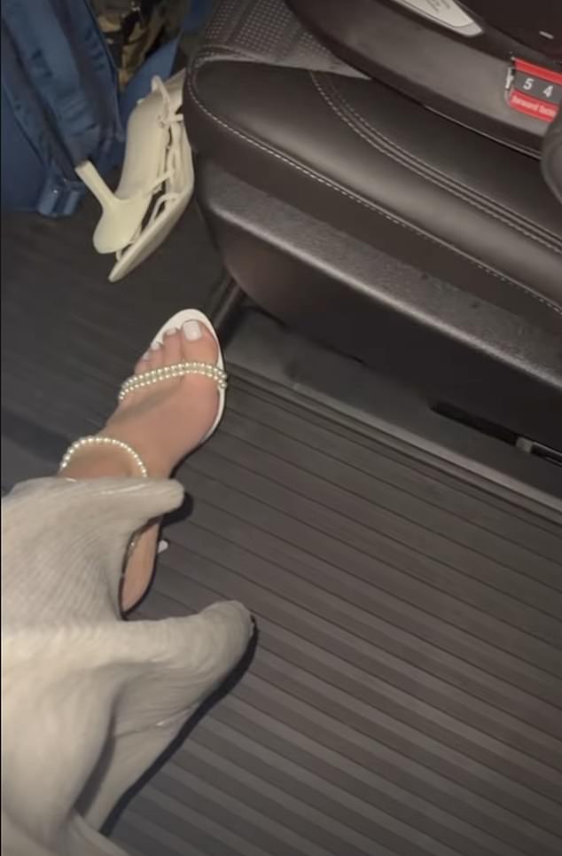 Kylie gave her 395 million Instagram followers a glimpse of her footwear in a video revealing that she was wearing white open-toe stilettos that featured straps of pearl strands