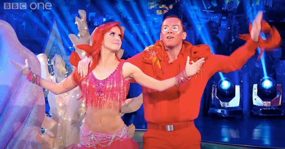 Scott Mills dressed as a lobster dancing with a woman dressed as Ariel on Strictly Come Dancing.