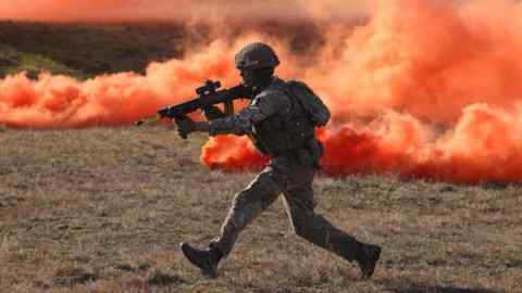 A British soldier storms an enemy position in a simulated attack during Nato’s ‘Brilliant Jump’ military exercise in Poland in 2024