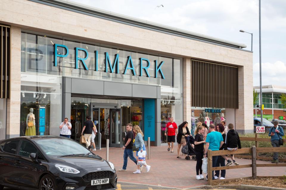 Primark store entrance with shoppers.