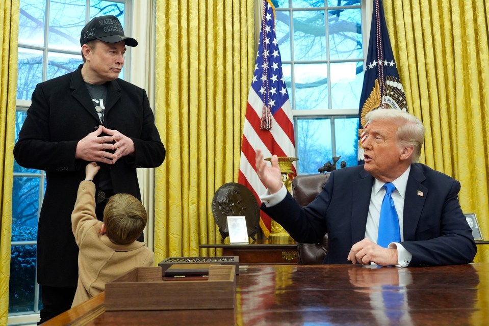 President Trump speaking with Elon Musk and his son in the Oval Office.