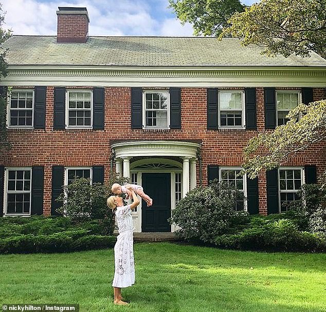 In addition to a sprawling West Hollywood estate and a luxurious Manhattan penthouse, Nicky's real estate portfolio also includes a $3 million neo-Georgian Hamptons mansion (pictured), where she spends the summer months with her family.