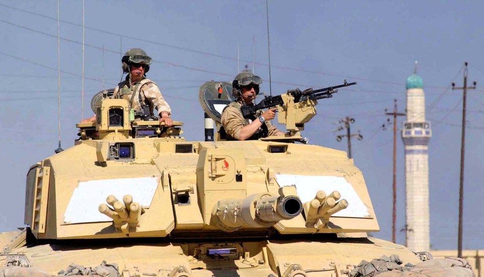 British soldiers in a Challenger 2 tank on patrol in Iraq.