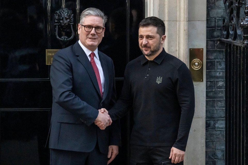 Volodymyr Zelensky and Keir Starmer shaking hands at Downing Street.