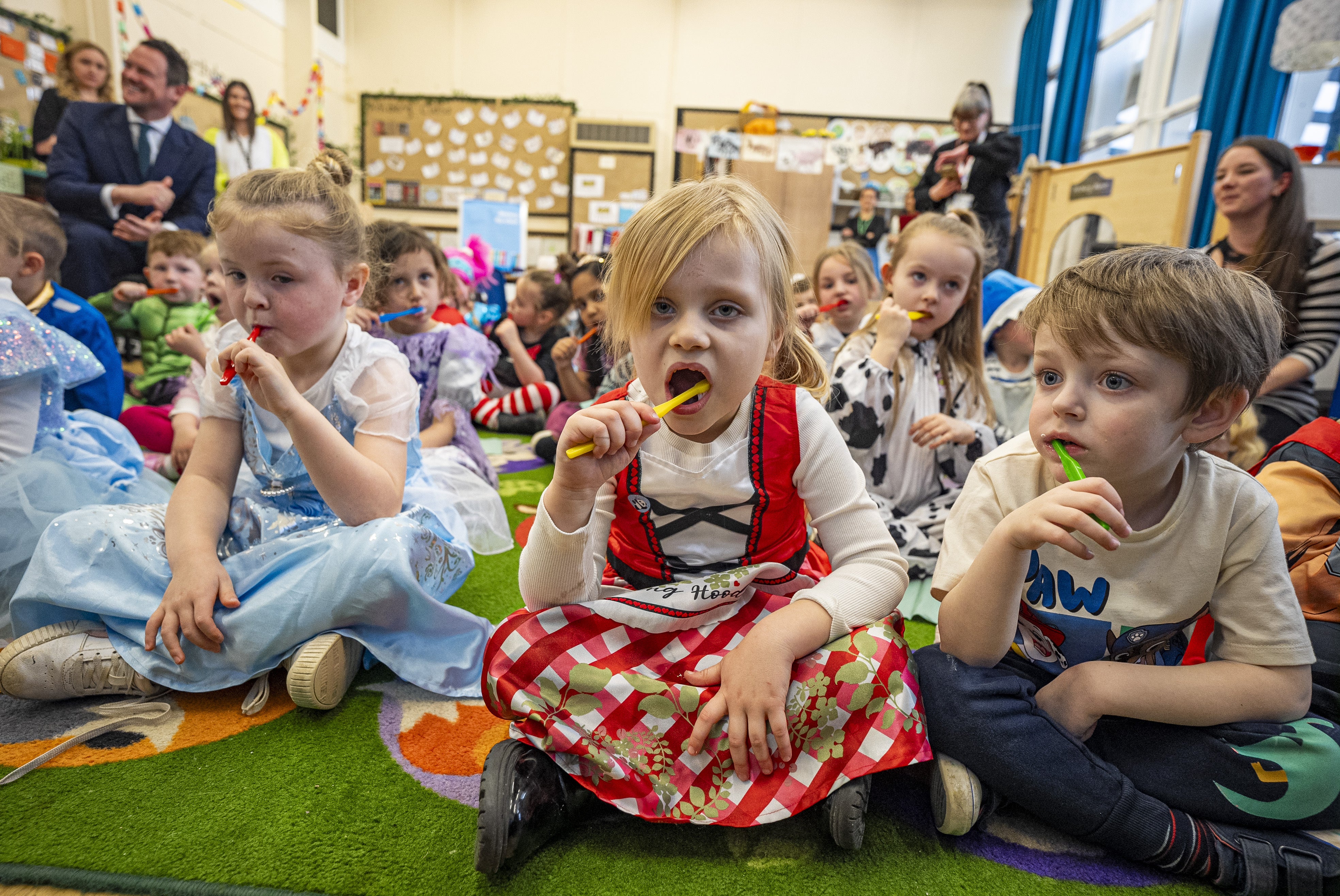 School children brush their teeth for two minutes inside a classroom at Fair Furlong Primary School in Bristol. Children should be brushing their teeth twice a day under new school readiness guidelines for parents.