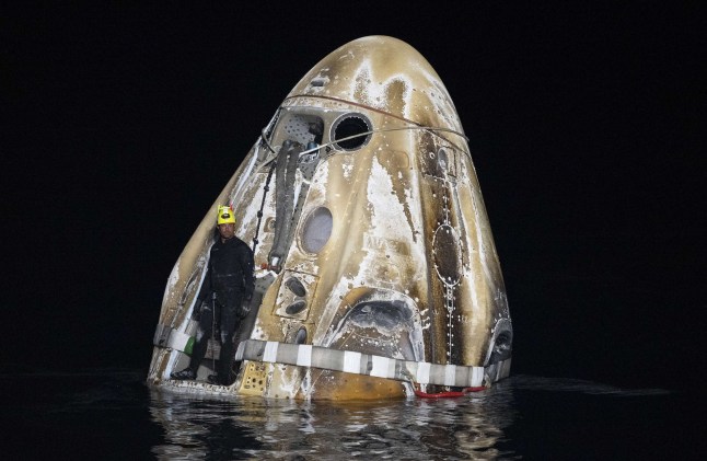 Mandatory Credit: Photo by Joel Kowsky/Nasa/Planet Pix via ZUMA Press Wire/Shutterstock (14822684b) Support teams work to secure the SpaceX Dragon Endeavour spacecraft after splashdown in the Gulf of Mexico, October 25, 2024 off the coast of Pensacola, Florida. The capsule carried Expedition 70 NASA astronaut Matthew Dominick, Michael Barratt, and Jeanette Epps, and Roscosmos cosmonaut Alexander Grebenkin, back from the International Space Station. NASA SpaceX Crew-8 Capsule Returns to Earth, Pensecola, Fl, United States of America - 25 Oct 2024