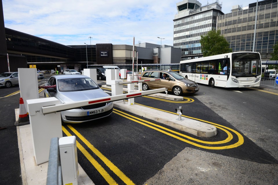 Cars at Manchester Airport drop-off zone.