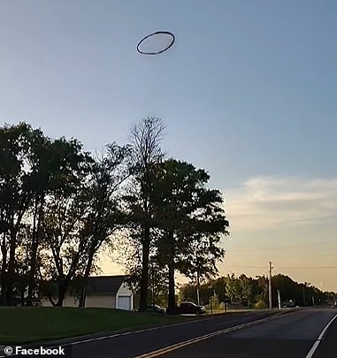 At first, the bizarre object appeared to be a ring of thick, black smoke. Camren said he spotted it hanging over County Road 2 between State Ave. and K32
