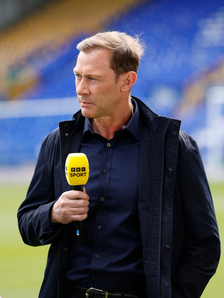 Duncan Ferguson holding a BBC Sport microphone.