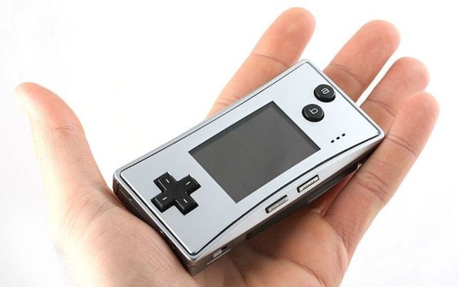Game Boy Micro in a person's palm