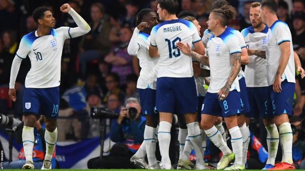 Jude Bellingham and his England team-mates celebrate against Scotland