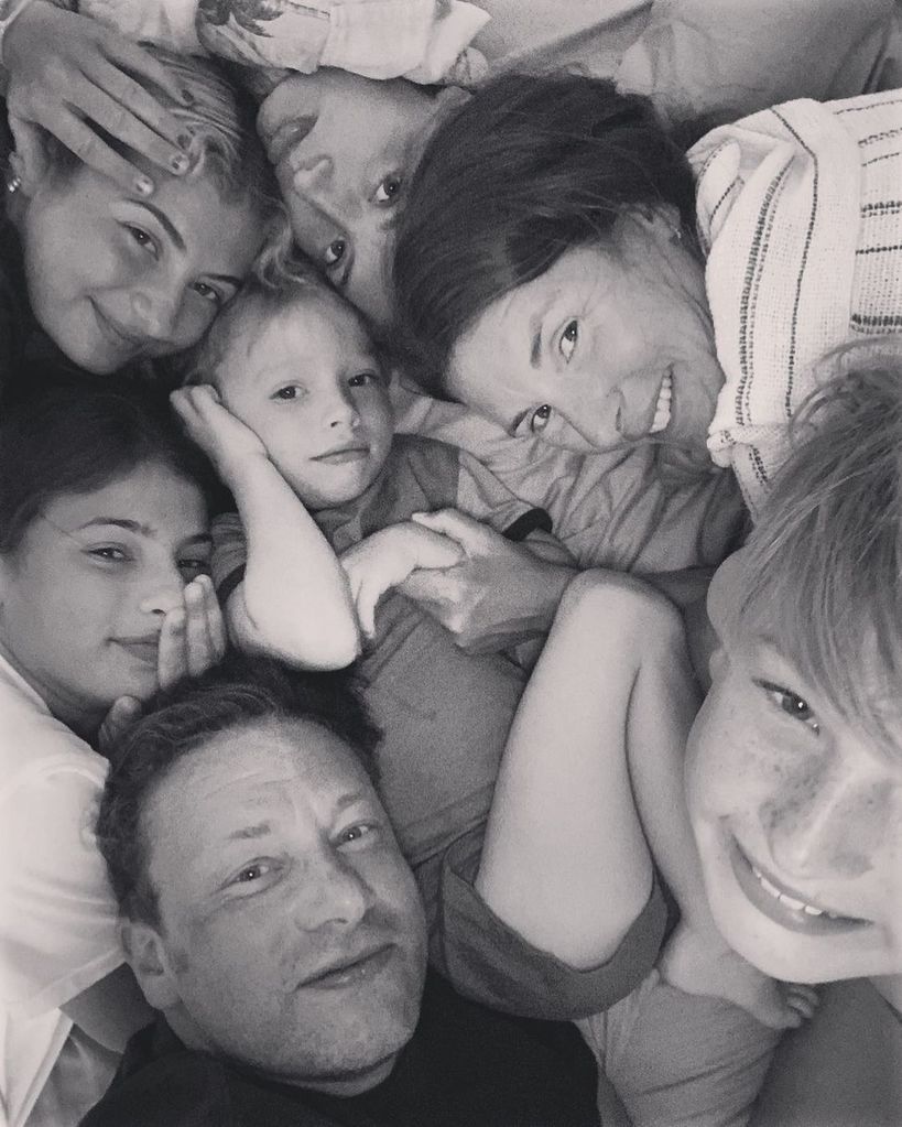 jools and jamie oliver with five children 