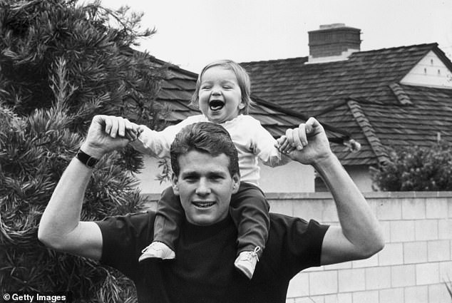 June 1965: He is pictured with daughter Tatum whom he shares with Joanna Moore as they were married from 1963 to 1967