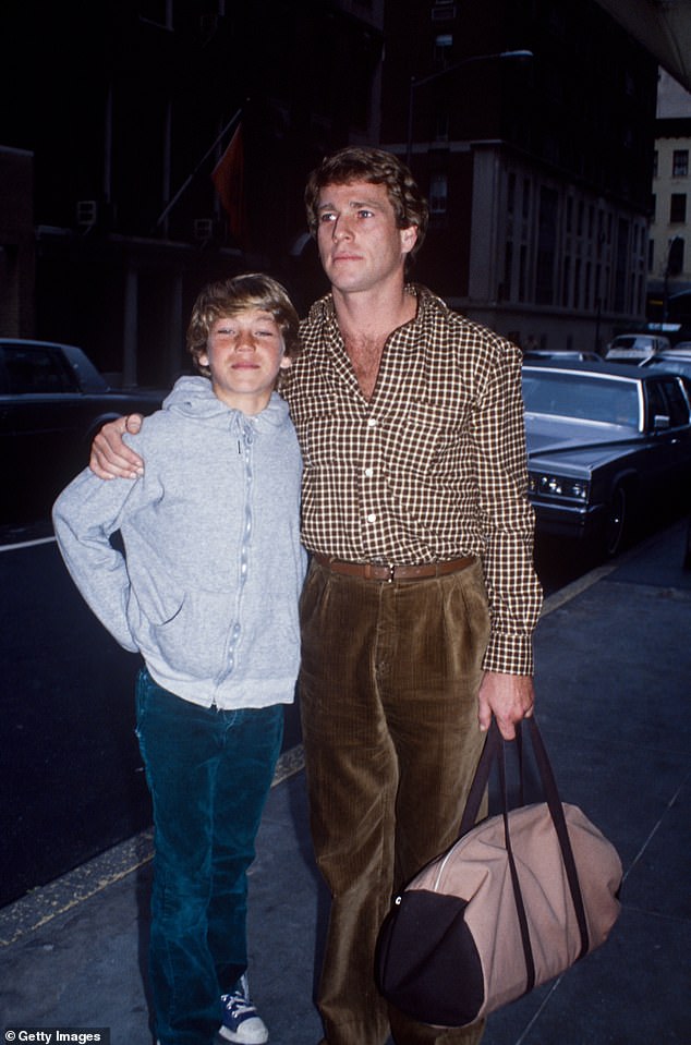 1970: O'Neal is seen with son Griffin - whom he also shares with ex-wife Moore - in New York
