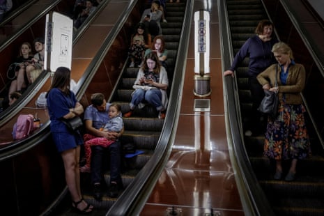 People shelter inside a subway station during an air raid alert amid Russia’s attack on Ukraine, in Kyiv, 29 May