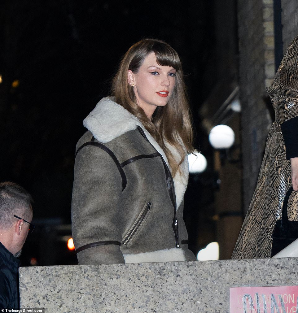 Fun: Taylor Swift appeared to be having the time of her life as she enjoyed a girl's night out with her longtime best friend Selena Gomez, Zoe Kravitz and Cara Delevingne