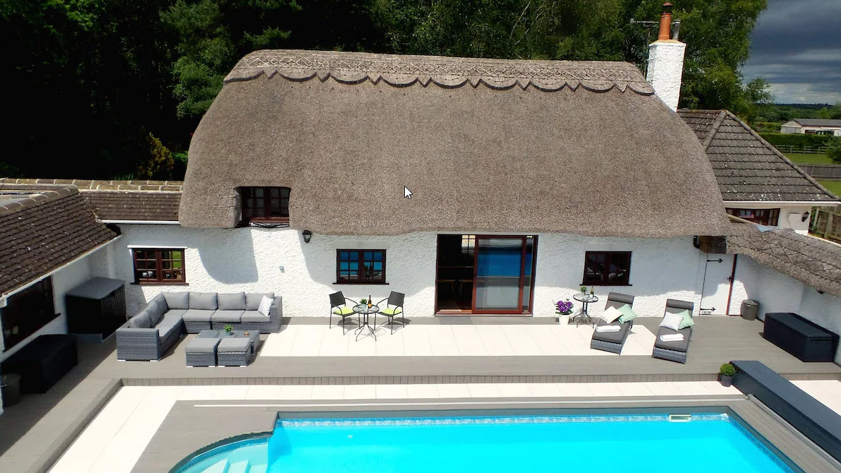 The thatched cottage has its own pool and its own pub