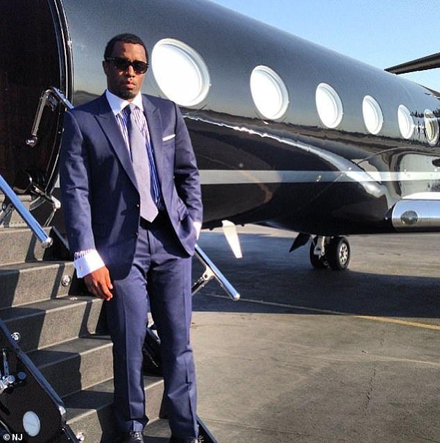 Diddy is pictured outside a LoveAir LLC Gulfstream 5. His plane was tracked from Los Angeles to the Caribbean after the raid, but there is no word on his current whereabouts