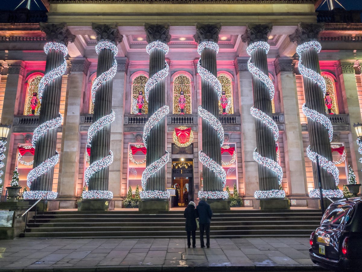 Example shot of building columns covered in festive lights