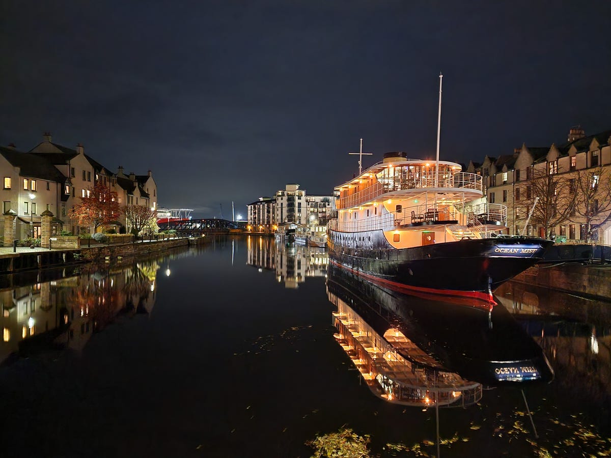 Boat on a river at night