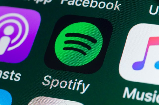 Spotify and other apps on an iPhone screen