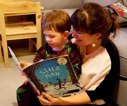 Sarah reading with Theo 