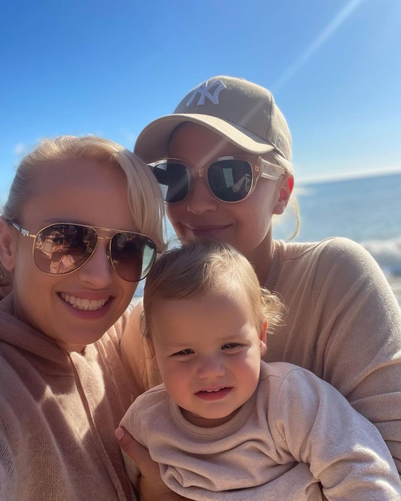 Rebel Wilson with her daughter and partner 