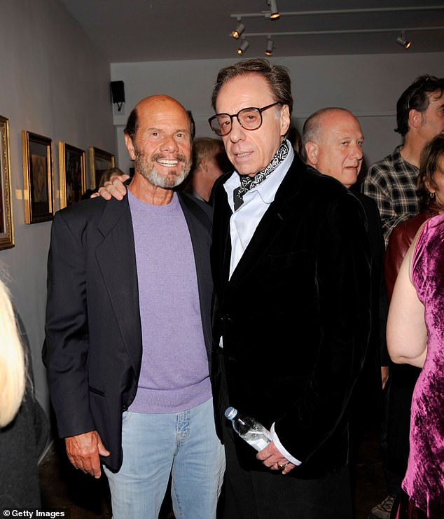Norman is pictured with the late film director and critic Peter Bogdanovich in 2008