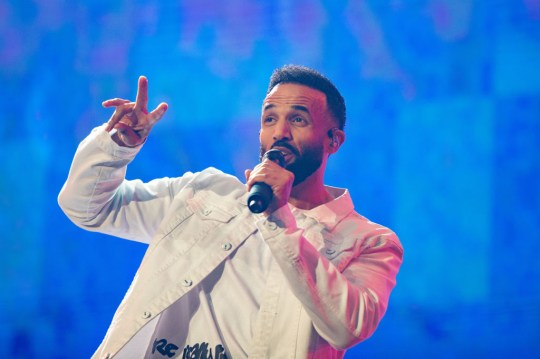 Craig David performing at The MOBO Awards 2022, holding up two fingers