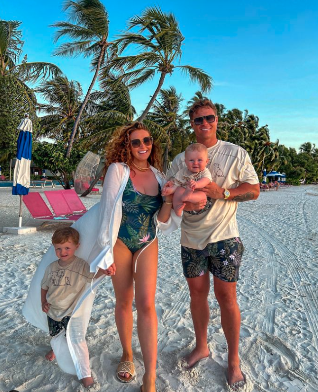 Charlotte left fans confused after posing with her family on a sandy beach