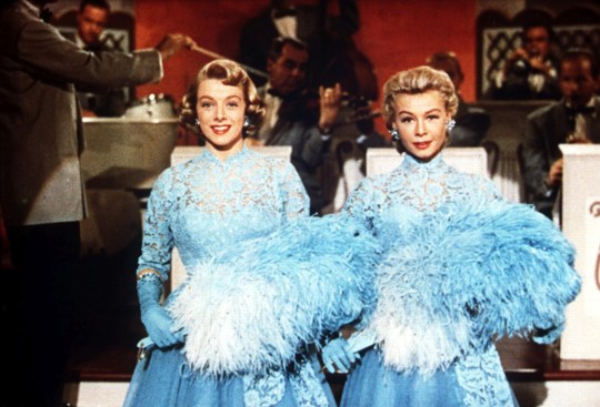 Rosemary Clooney and Vera-Ellen perform the song Sisters with blue fans in the film White Christmas