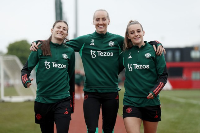 Hannah Blundell, Millie Turner and Ella Toone of Manchester United Women in action during a training session at Carrington Training Ground