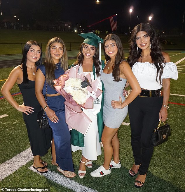Joe wrote he 'wished' he could've attended their 18-year-old daughter Milania's (M, pictured Sunday) high school graduation ceremony on Sunday alongside their other daughters Gia, 23; Gabriella, 19; and Audriana, 14