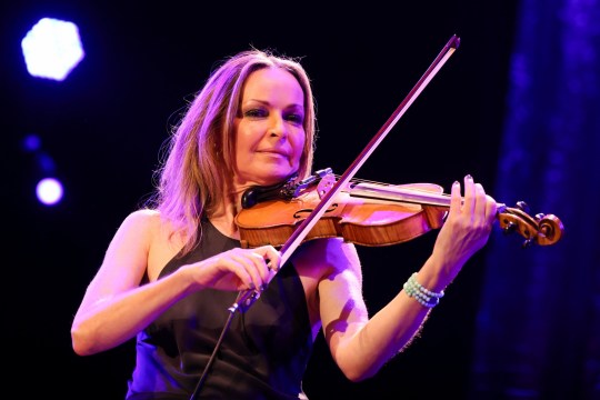 Sharon Corr of The Corrs performs on her violinat Spark Arena on November 09, 2023 in Auckland, New Zealand