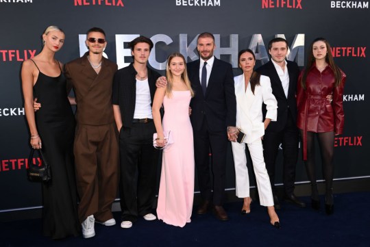 David Beckham, Victoria Beckham and their children Brooklyn, Cruz, Romeo and Harper at a Netflix event for their documentary. They are also joined by Nicola Peltz and Mia Regan