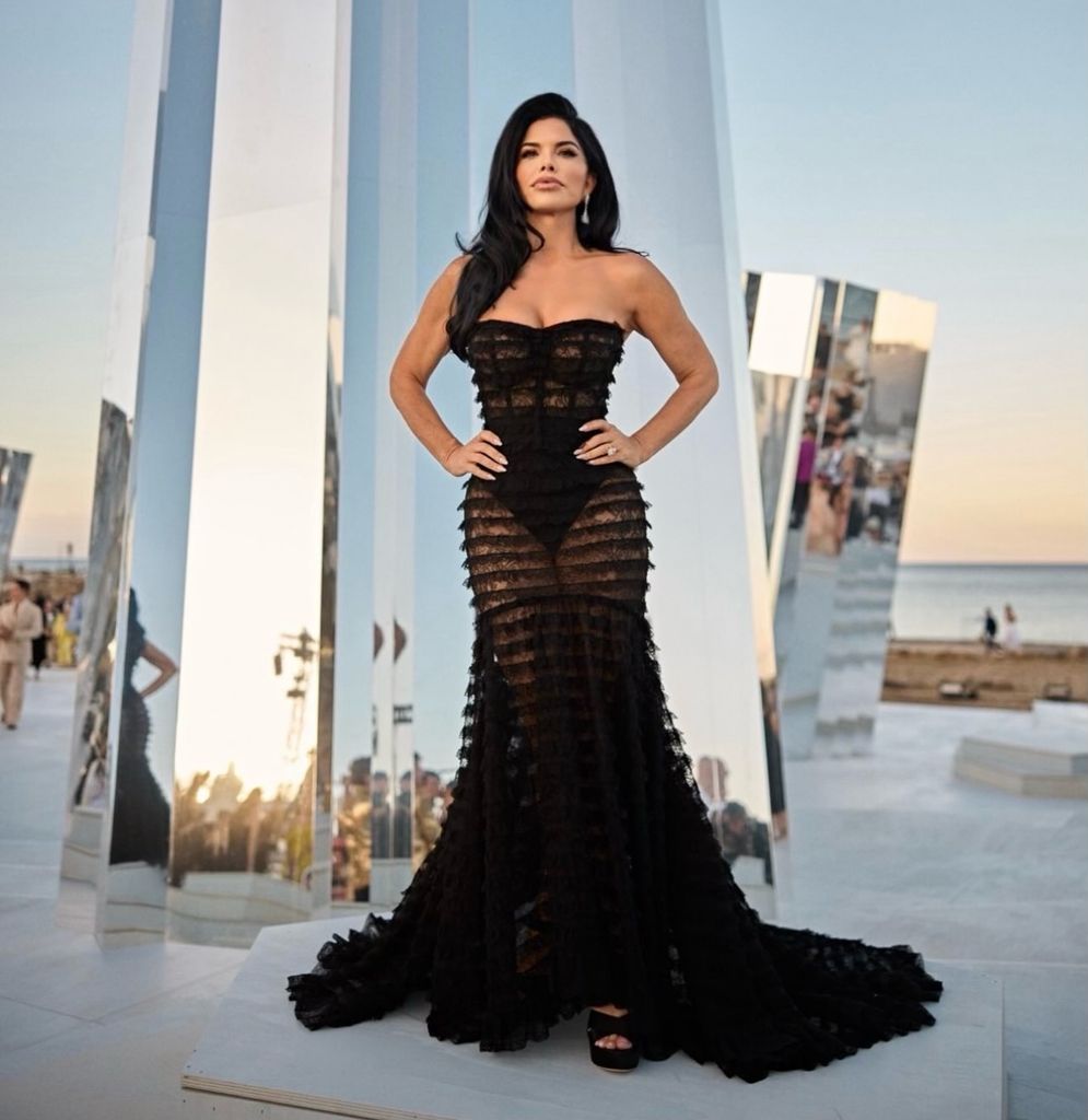 Lauren Sanchez poses outside the Dolce and Gabbana Alta Moda show
