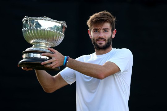 Jacob Fearnley of Great Britain celebrates with a trophy after winning his first title on the ATP Challenger Tour in Nottingham